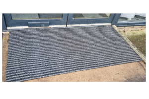 grey and black striped outdoor mat