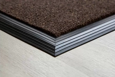 Get the Same Coir Look but Without the Shed – Why Choose Brush Matting?
